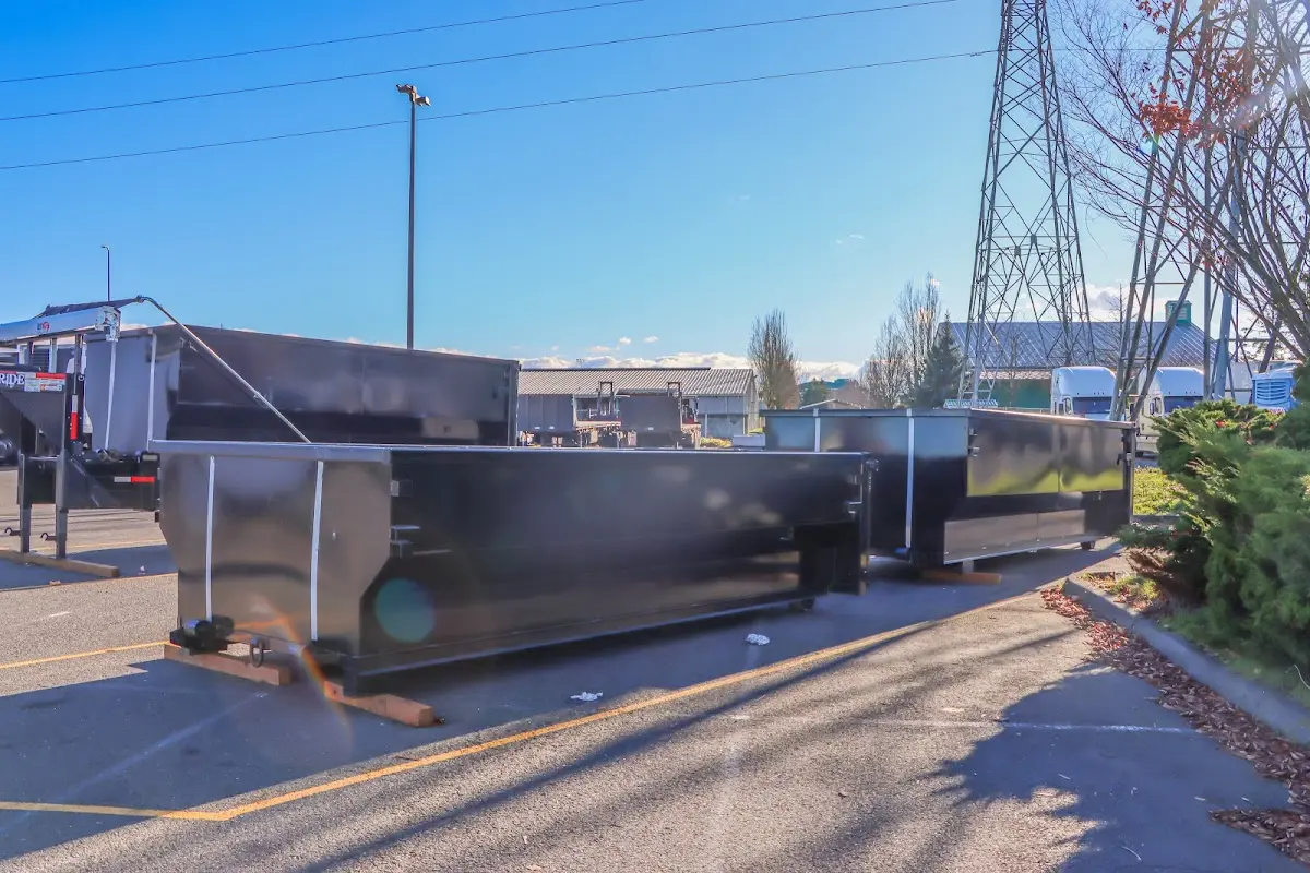 Roll-off dumpster ready for waste disposal at job site for 15 Yard Dumpster Rental in Groesbeck